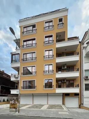 an apartment building with balconies on a street at SOS CoMFORT 2 LAZUR in Burgas City