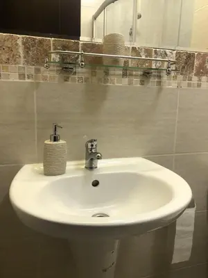 a bathroom with a white sink and a mirror at Private Studio Sunny Beach- Cascadas in Sunny Beach