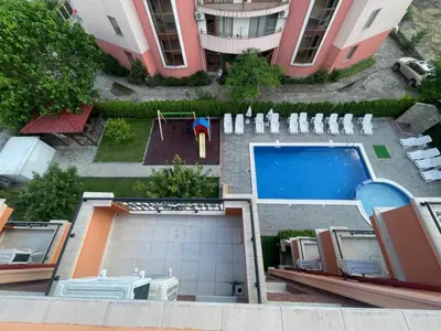 an aerial view of a courtyard with a swimming pool at A Tiny Flat in Sunny Beach