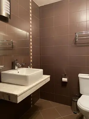 a bathroom with a sink and a toilet at SEAVIEW Heaven Sunny Beach in Sunny Beach