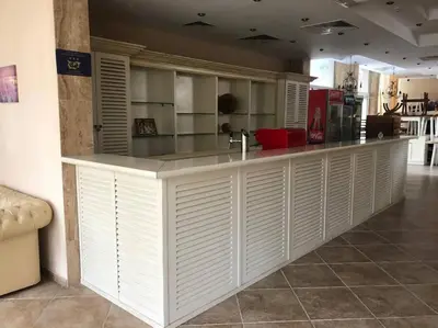 a kitchen with a white counter with a sink at Spacious, 1 Bed Apt, Dawn Park in Sunny Beach