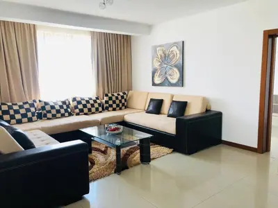 a living room with a couch and a coffee table at Mia Cassa in Sveti Vlas