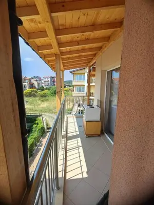 a balcony of a house with a view of the ocean at The View Apartment in Sozopol