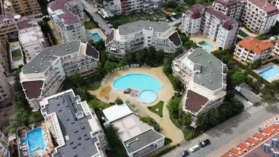 an aerial view of a city with a swimming pool at Kims One-bed Apart for rent at Sunny Beach Resort in Sunny Beach