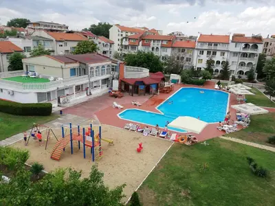 an aerial view of a swimming pool with a playground at Apartments Bravo 1-Vichevi in Sunny Beach