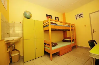 a room with two bunk beds and a sink at Yo Ho Hostel in Varna City