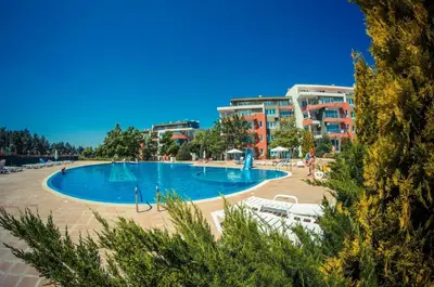 a large swimming pool in front of a building at GT Green Fort Beach Apartments in Sunny Beach