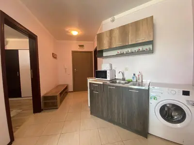 a kitchen with a sink and a washing machine at SUNNY BEACH PLAZA 4-34 Apartment in Sunny Beach