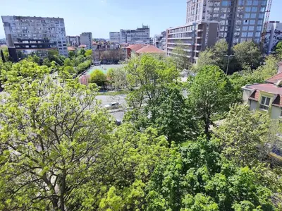 a view of a city with trees and buildings at Sea apartment Lazur - next to the beach in Burgas City