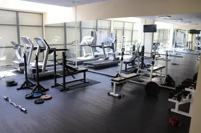 a gym with several treadmills and other equipment at Sea View Private Studio Paradiso B 508 in Nesebar