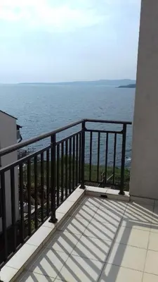 a balcony with a view of the ocean at Вила Дафни - Villa Dafni in Sozopol
