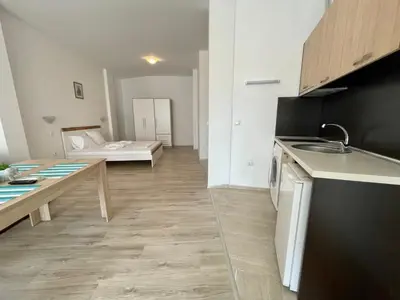 a living room with a kitchen and a bedroom at Sveti Vlas - Central Beach Studio by Flat Mаnаger in Sveti Vlas