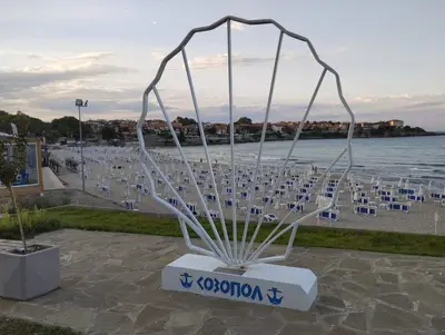 a large sculpture of a ship on a beach at Apartament Lili Sozopol in Sozopol