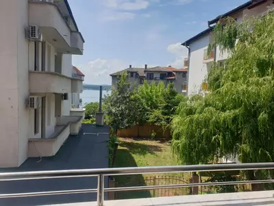 a view from the balcony of a building at Стаи за гости Мистрал in Primorsko