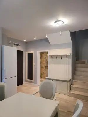a kitchen and dining room with a table and chairs at Green Line Villa Sozopol in Sozopol