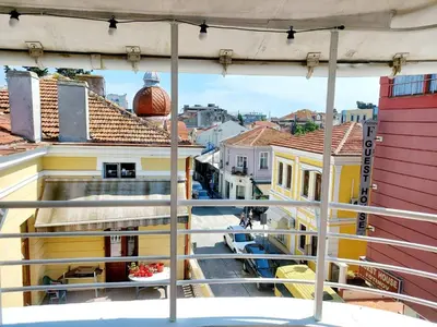 a view of a city from a balcony at Comfort Flat in Burgas City