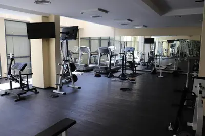 a gym with a lot of treadmills and machines at Sea View Private Studio Paradiso B 509 in Nesebar