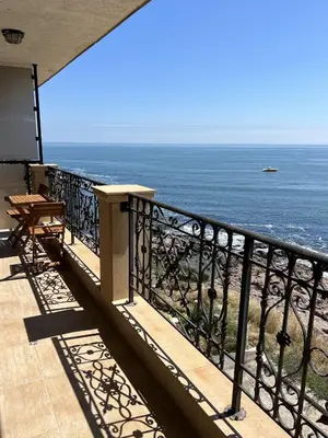 a balcony with a view of the ocean at Sea View 2BR Apartment Sozopol in Sozopol