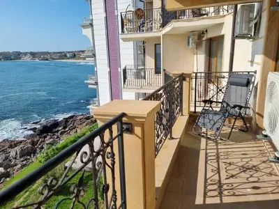 a balcony of a house with a view of the ocean at Sea View 2BR Apartment Sozopol in Sozopol