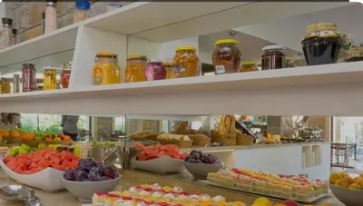 a buffet of fruits and vegetables on display in a store at Wonderful Deluxe Appartement in Cascadas Family Resort Sunny Beach in Sunny Beach