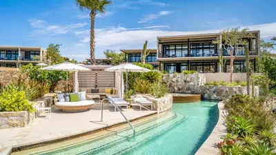 an exterior view of a house with a swimming pool at SIANA4 in Sveti Vlas
