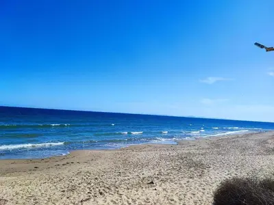 a sandy beach with the ocean in the background at Apartament Sea Fort Club Grand Resort Fort Noks Sveti Vlas-Bastet BS in Elenite