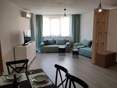 a living room with a couch and a table at Apartament Sea Fort Club Grand Resort Fort Noks Sveti Vlas-Bastet BS in Elenite