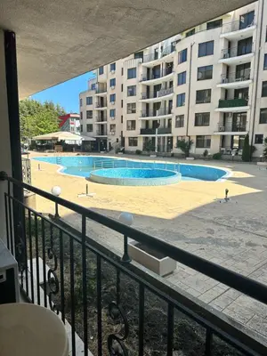 a view of a swimming pool from a balcony at AVALON, Apartment C102 in Sunny Beach