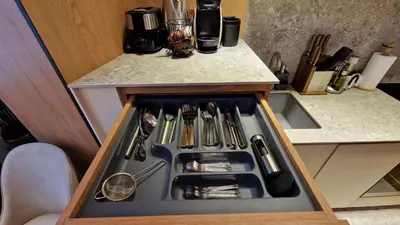 a kitchen with a sink with utensils in it at FS Apartments - Family apartment in the top center of Varna in Varna City