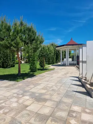 a pavilion with a gazebo in a park at Prestige Fort Beach apartment, Studio in Sveti Vlas
