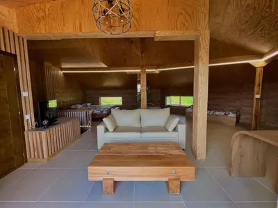 a living room with a couch and a coffee table at Seagull Studio Byala in Byala