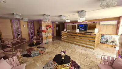 an overhead view of a waiting room with tables and chairs at Sweet Home 2 Apartment in Sunny Beach