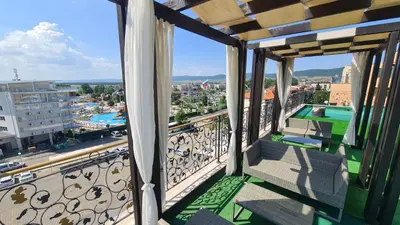 a balcony with a view of a city at Sweet Home 2 Apartment in Sunny Beach