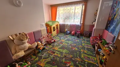 a childs room with toys on the floor at Sweet Home 2 Apartment in Sunny Beach