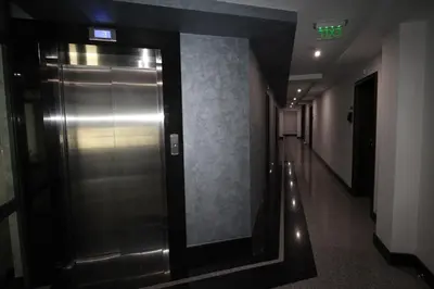 a hallway with an elevator in a building at PARADISO 'В' 201 One Bedroom Apartment in Nesebar