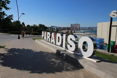 a large sign that says razao on a sidewalk at PARADISO 'В' 201 One Bedroom Apartment in Nesebar