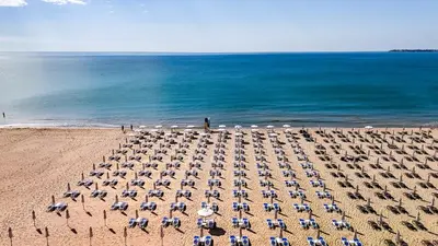 an overhead view of a beach with chairs and umbrellas at Sentido Bellevue Beach- All Inclusive & Beach Access in Sunny Beach