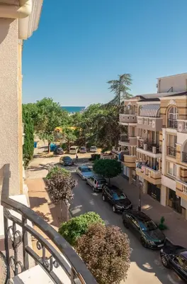 arial view of a city with cars parked on a street at Melia lux apartment in Ravda