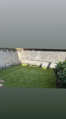 a view of a yard with green grass at Amber Home - brand NEW luxury 1 bedroom apartment located in the very city center in Varna City