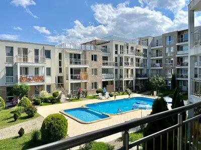 a view of an apartment complex with a swimming pool at Апартамент Атлантик Бяла - Apartment Atlantic Byala in Byala