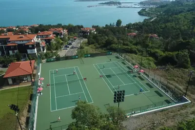 an aerial view of a tennis court in a city at Sea Bliss Retreat -Santa Marina - Sozopol in Sozopol