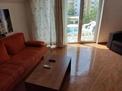 a living room with a couch and a coffee table at Billy's two- bed apart for Rent at Sunny Beach in Sunny Beach