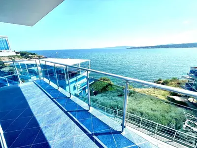 a balcony with a view of the water at Villa Mare Blu in Sozopol