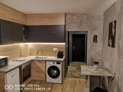 a kitchen with a sink and a dishwasher at MitProt Panorama Bay 2 Studio 206 in Sveti Vlas