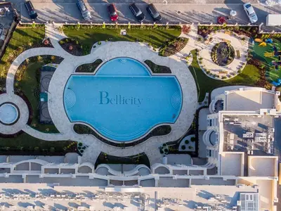 an aerial view of a building with a pool at Golden leaf, swimming pool view in Ravda