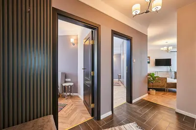 a hallway with a door leading to a bedroom at Florance Rentals Luxury Apartments in Saint Vlas in Sveti Vlas
