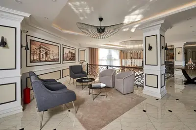 a living room with chairs and a table at Florance Rentals Luxury Apartments in Saint Vlas in Sveti Vlas