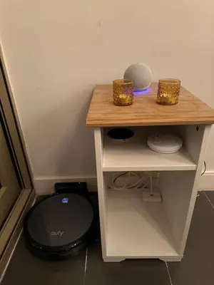 a small table with two baskets on top of it at Sea view Penthouse (YooBulgaria) in Obzor