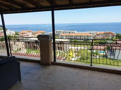 a large balcony with a view of the ocean at Panoramic Sea View Apartment in Byala