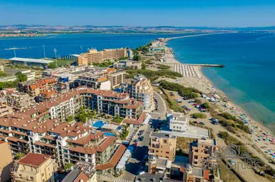 an aerial view of a beach and buildings at Rose Gardens Apart Hotel in Pomorie